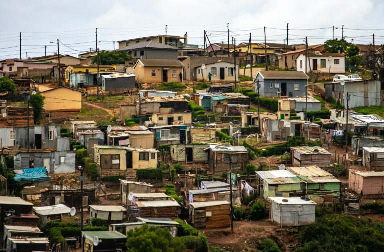 Captivating aerial photo showcasing a densely packed informal housing settlement.